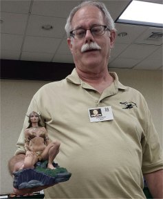 Mike Conran with auction statue